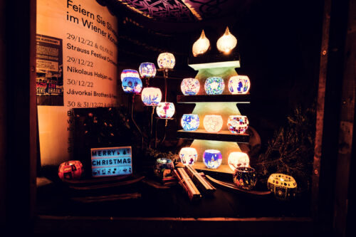 Festive decorations and market stalls in Spittelberg artisan quarter.