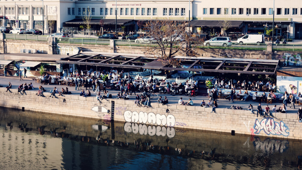 Vienna Donaukanal lined with bars and restaurants.