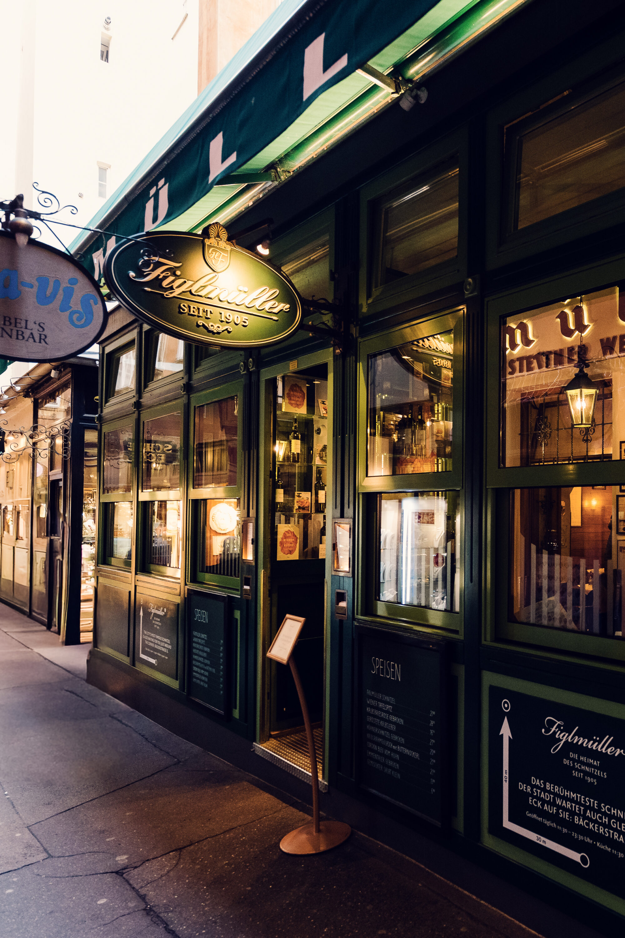 Street view of Figlmüller Wollzeile location in Vienna's historic city center.