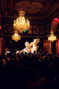 Animated projection of Johann Strauss on the LED screen in the Strauss Hall.