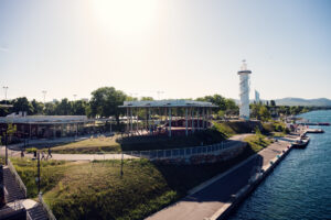 Copa Beach with its white lighthouse and grassy terraces along the Neue Donau.