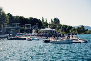 Boats moored along the Neue Donau marina below the Copa Beach terraces.