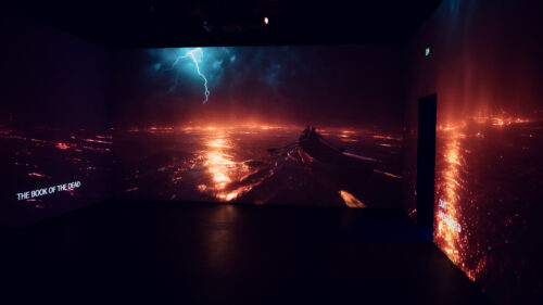 Lightning and glowing lava projected across the 360-degree room during the Book of the Dead sequence.