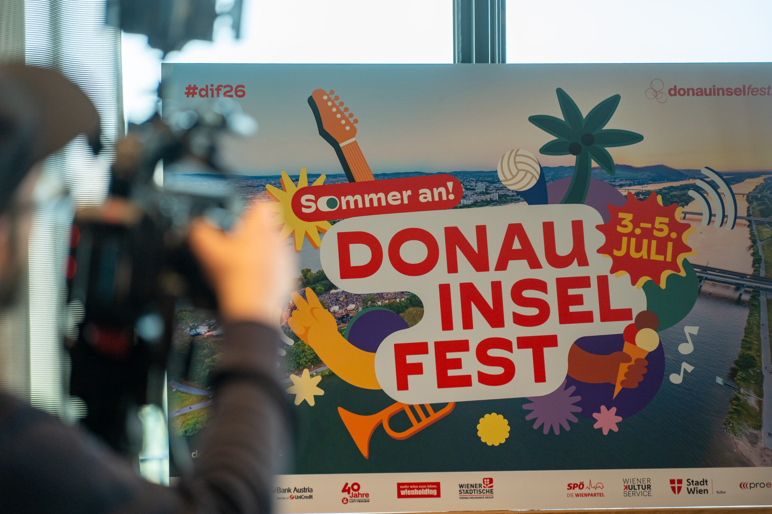 Donauinselfest 2026 campaign display reading Sommer an, 3 to 5 July, at the programme presentation